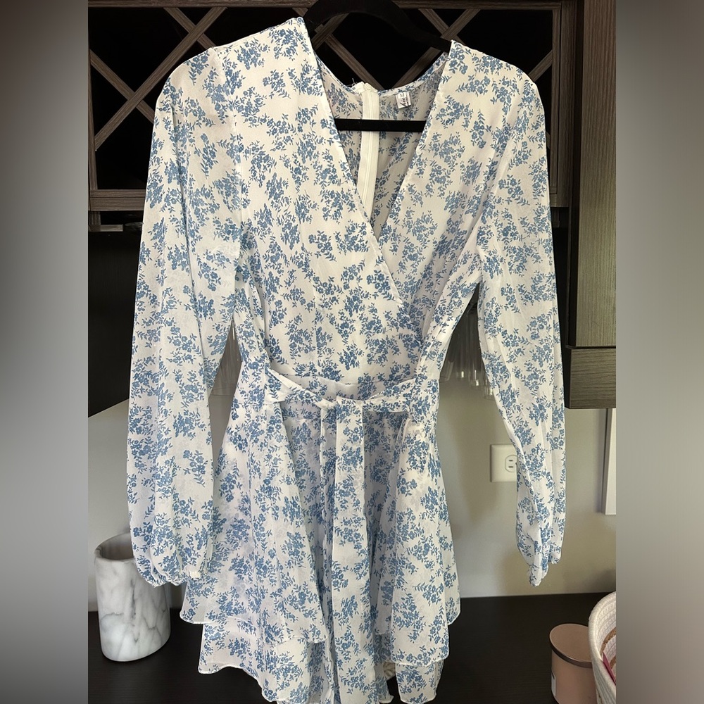 White and blue floral long sleeve romper with tie